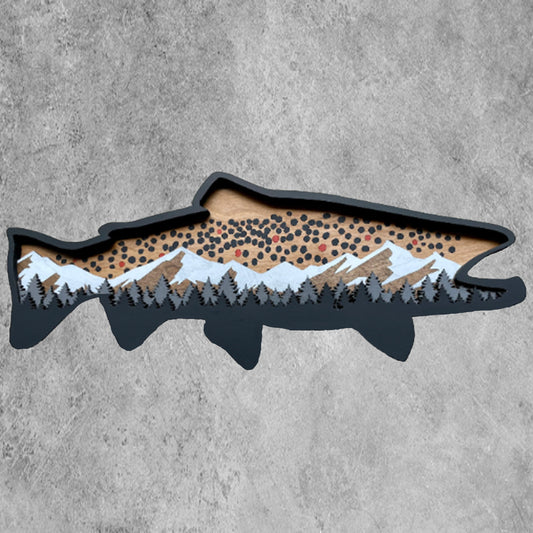 Brown Trout wood art featuring a black border that beautifully complements its dimensional snow-capped mountains and pine trees, highlighting the intricate Brown Trout spots and colors.